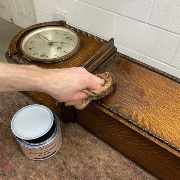 Apply wax to clock case